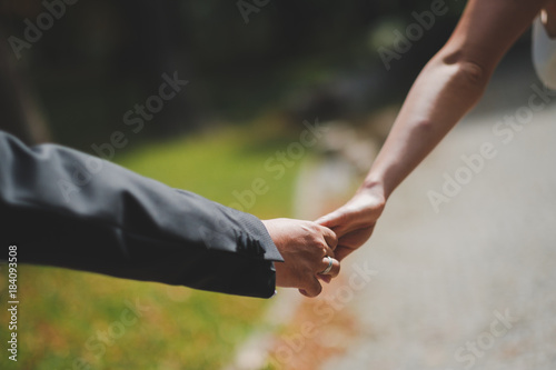 Wedding Couple Bride and Groom holding hands © Wedding Nature Stock