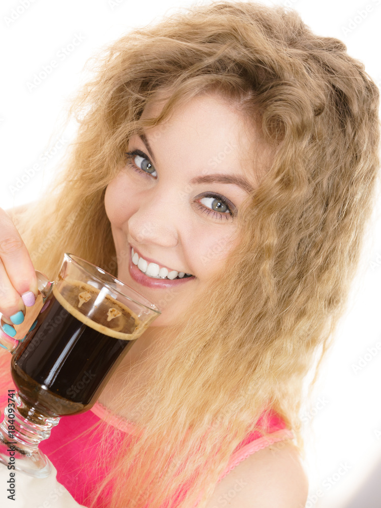 Positive woman drinking her morning coffee Positive woman drinking her morning coffee