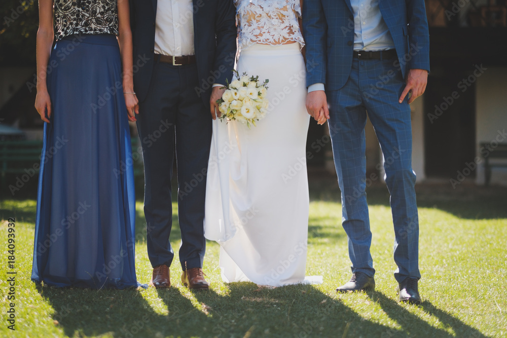 Wedding Couple Bride and Groom and rest of the party standing in line