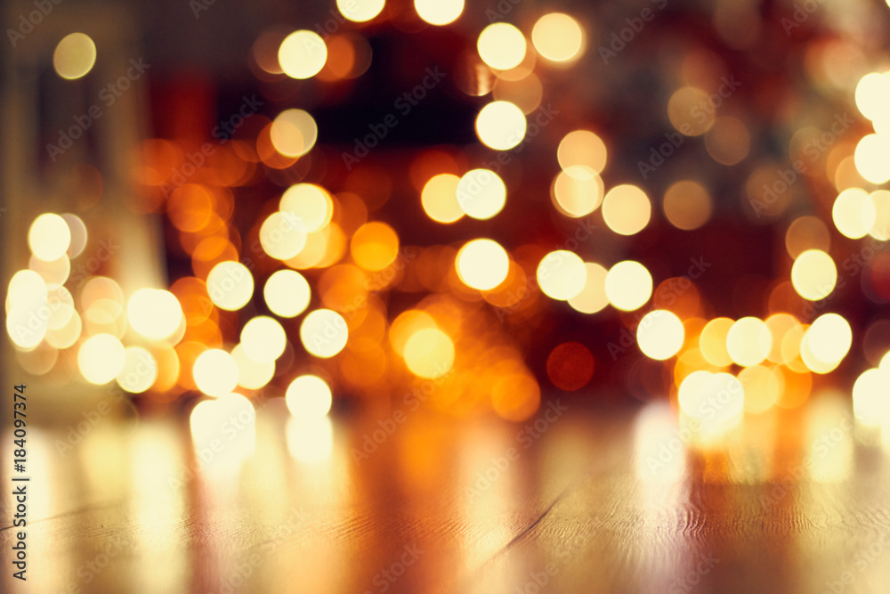 Fototapeta premium Photo of a New Year's garland abstract sparks./Beautiful Rasfokus lights of Christmas garlands.