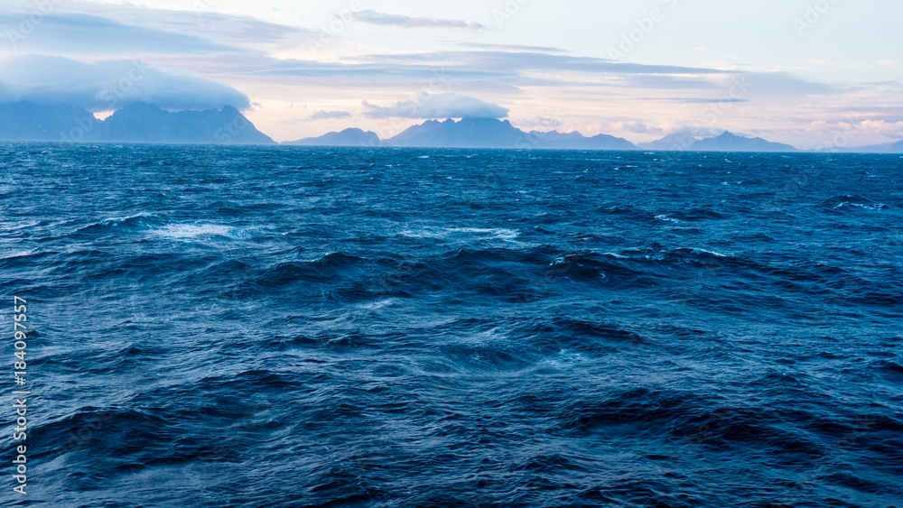 Fototapeta premium Lofoten, Norway. The beautiful dramatic sea view and cloudy sky in Lofoten.