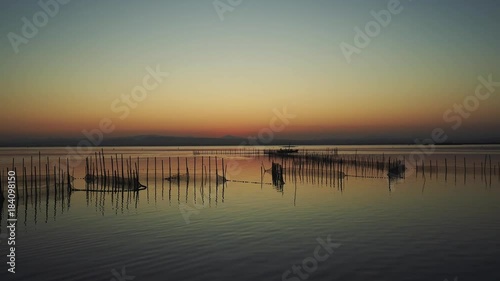 The sunset under lake photo