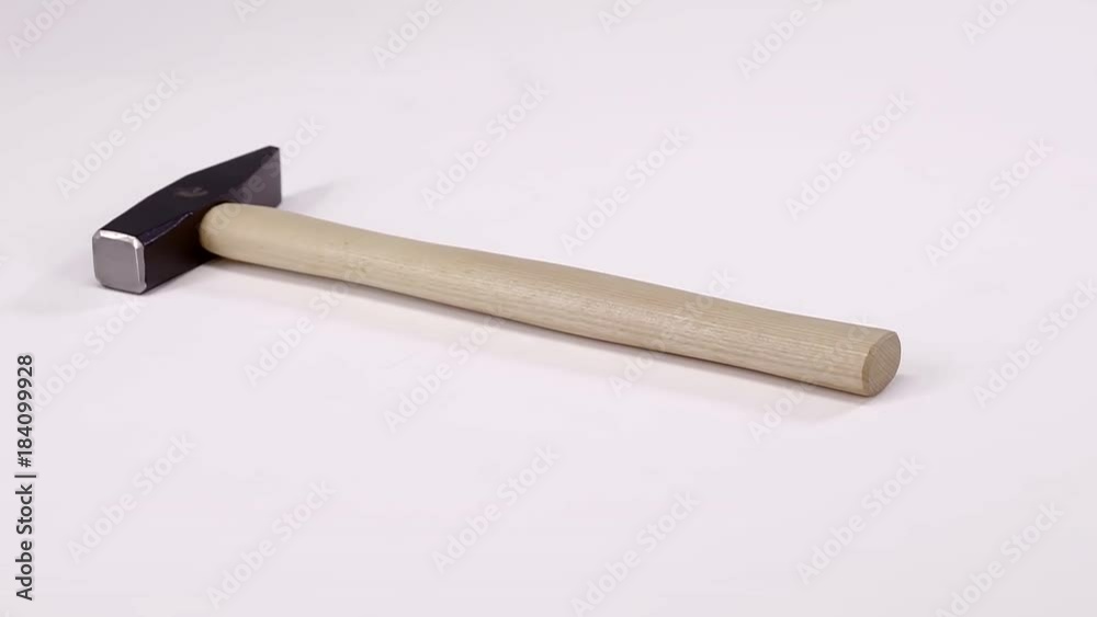 New hammer with wooden handle isolater on the white New hammer with wooden handle isolater on the white