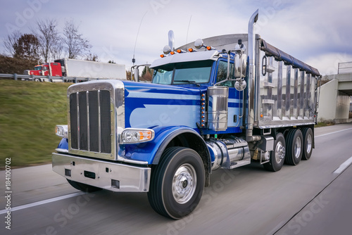 Dump truck on highway new truck chrome