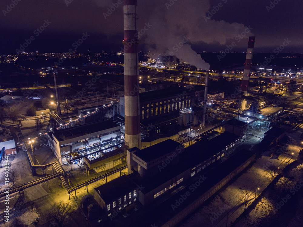 Aerial view of central heating station Vilnius city power plant, Lithuania. During winter season night time.