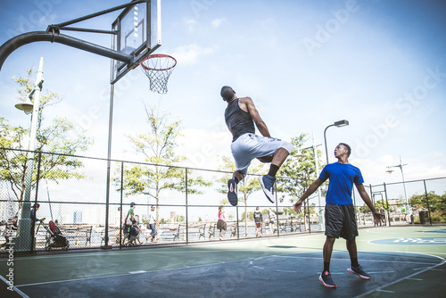 Basketball player playing outdoors © oneinchpunch