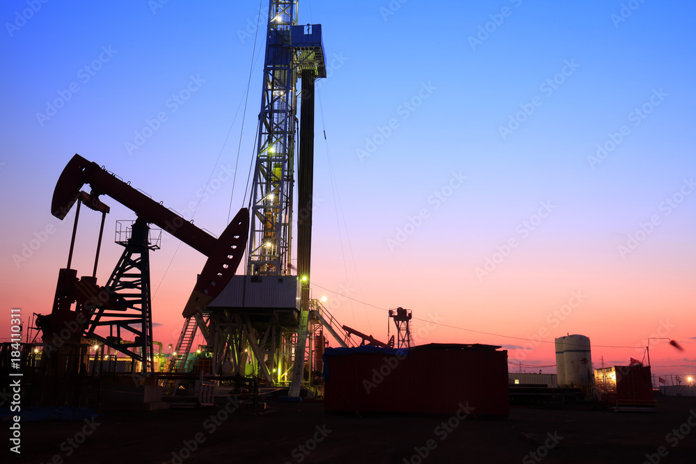 In the evening of oilfield derrick In the evening of oilfield derrick