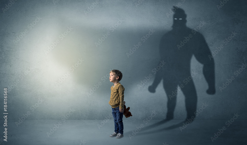 Cute kid with hero shadow behind Cute kid with hero shadow behind