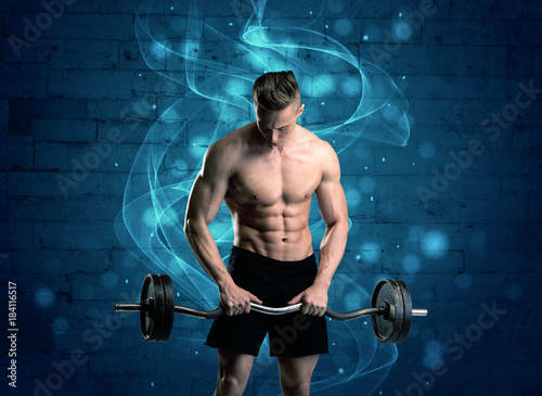 Attractive strong fitness guy lifting weight
