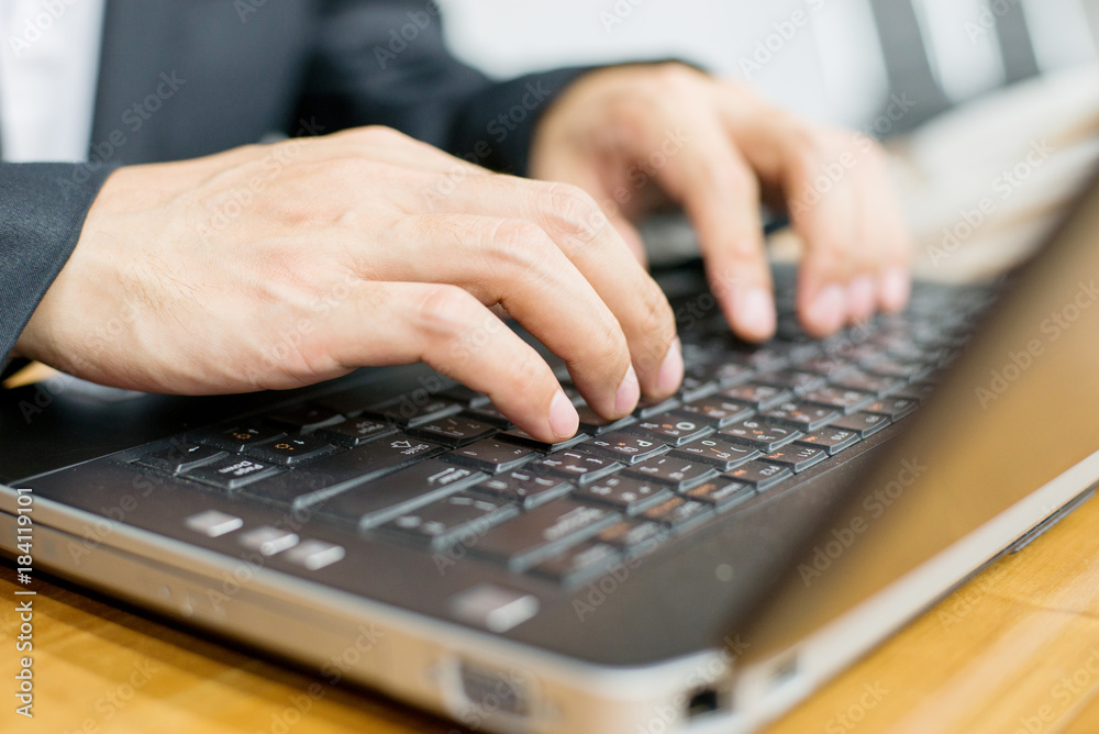 close up hand of businessman typing keyboard on laptop. business people and technology concept. close up hand of businessman typing keyboard on laptop. business people and technology concept.