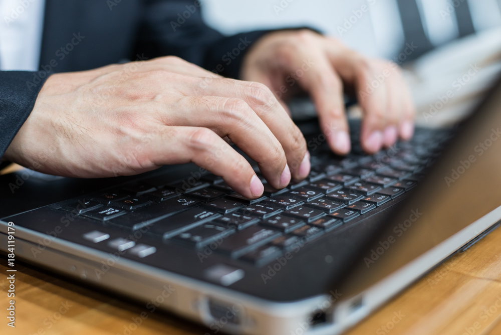 close up hand of businessman typing keyboard on laptop. business people and technology concept. close up hand of businessman typing keyboard on laptop. business people and technology concept.