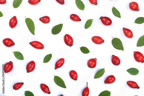 rosehip berries isolated on white background. Flat lay pattern. Top view