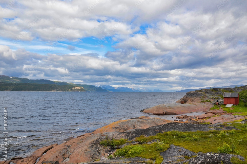 Cloudy dramatic sky over Alta Fjord, Norway, taken from the UNESCO site location Cloudy dramatic sky over Alta Fjord, Norway, taken from the UNESCO site location