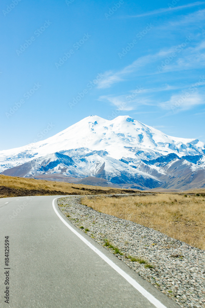 Fototapeta premium Road to the mountain Elbrus autumn