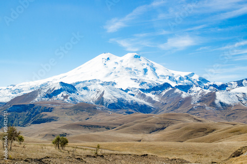 Landscape panorama Elbrus mountain with autumn hills