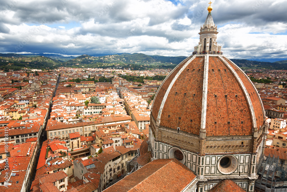 View of the dome of Florence Cathedral and the Florence city in the background .