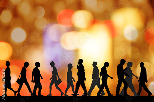 People walking on shopping district at neon background