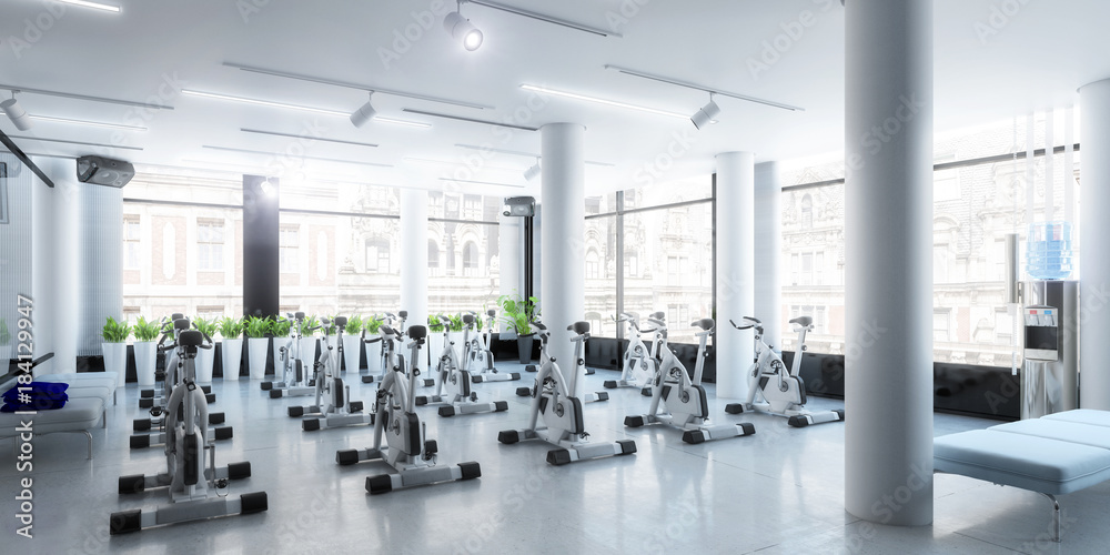 Ergometer im Fitness-Zentrum (panoramisch) Ergometer im Fitness-Zentrum (panoramisch)