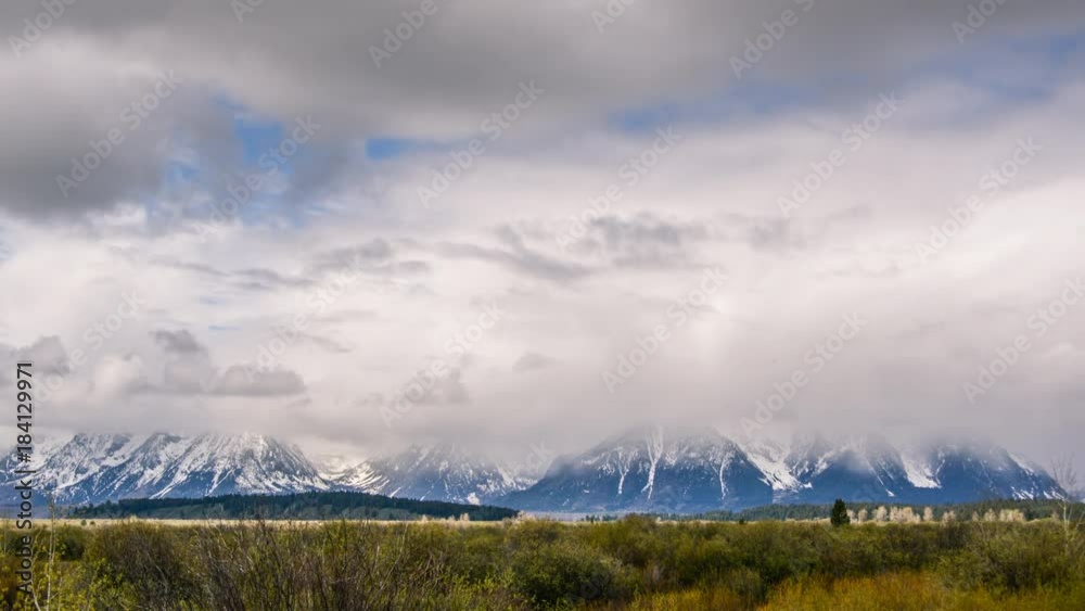 Timelapse. Snow mountains in cloudy day,Grand Teton National Park. Timelapse. Snow mountains in cloudy day,Grand Teton National Park.