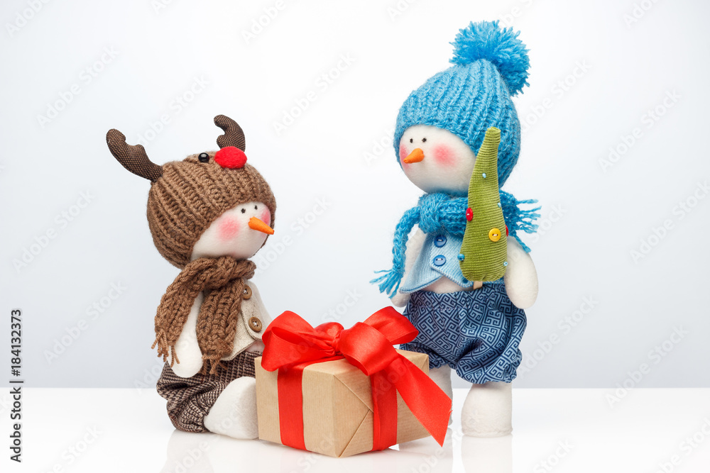 Merry Christmas and Happy New year, winter concept. Snowmen and gift. Merry Christmas and Happy New year, winter concept. Snowmen and gift.