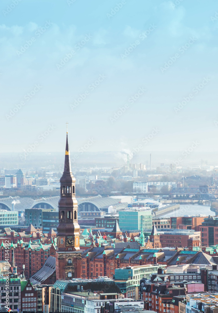 Aerial view of HafenCity, Church of St. Catherine and downtown. Hamburg, Germany