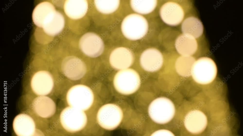 Abstract background Yellow bokeh light from the Christmas tree.lights would suit a Christmas theme Abstract background Yellow bokeh light from the Christmas tree.lights would suit a Christmas theme