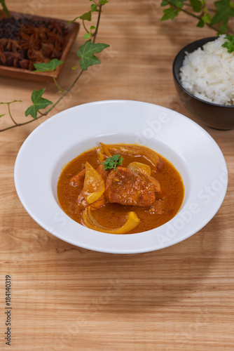 Chicken curry in a bowl / Vietnam chicken curry on wooden background