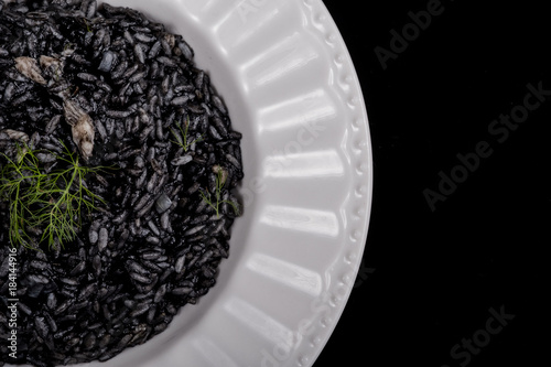 Cuttlefish ink and bogue risotto close up