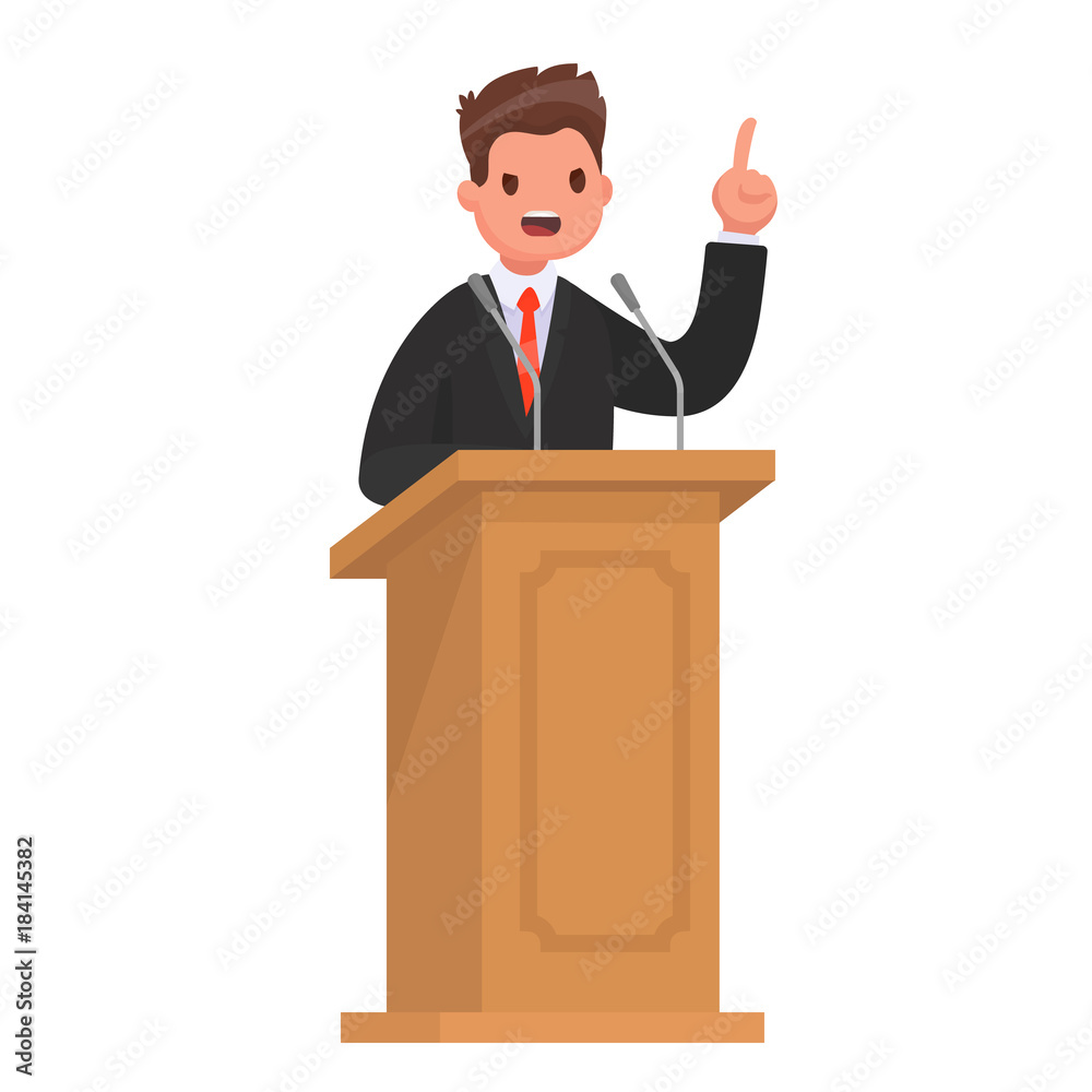 Speaker at the rostrum. The politician gives a speech at the tribune Speaker at the rostrum. The politician gives a speech at the tribune