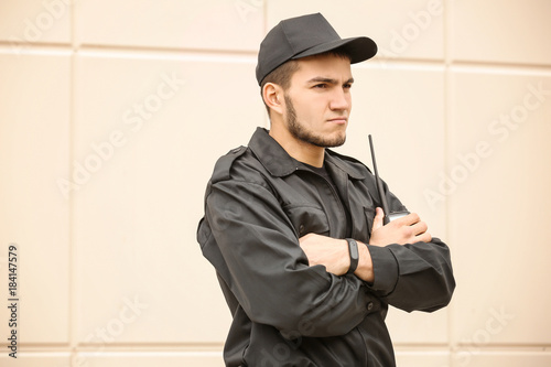 Male security guard with po...
