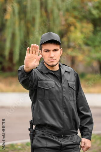 Male security guard on city...