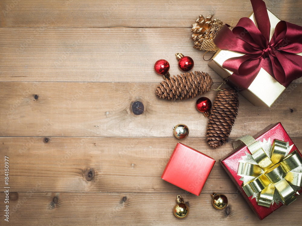 Christmas decorations, giftbox wooden background. Empty space for designer text.top view composition. Christmas decorations, giftbox wooden background. Empty space for designer text.top view composition.