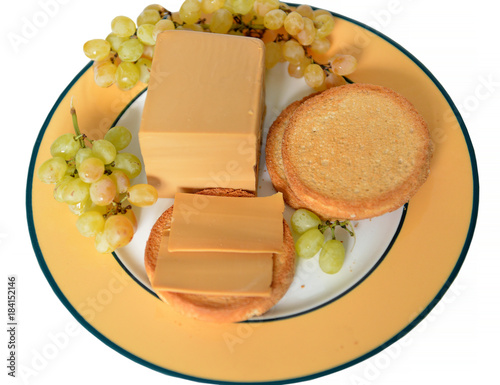 Famous Brunost (brown cheese) is common, Norwegian name for mysost, family of cheese-related foods made with whey, milk and/or cream. Brunost is primarily produced and consumed in Norway photo