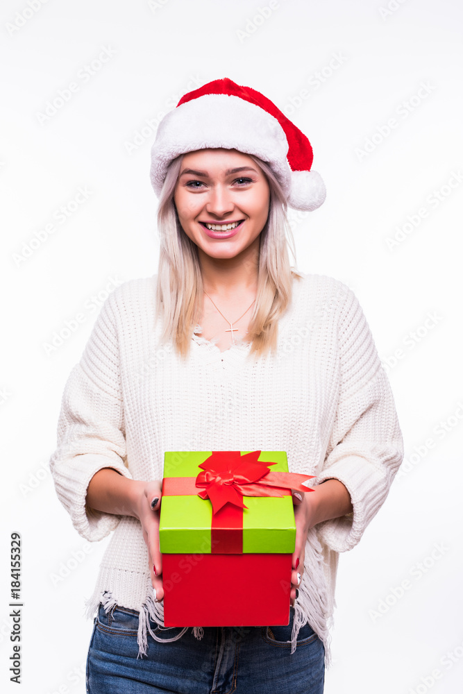 Christmas Santa hat isolated woman portrait hold christmas gift. Smiling happy blonde girl on white background. Christmas Santa hat isolated woman portrait hold christmas gift. Smiling happy blonde girl on white background.