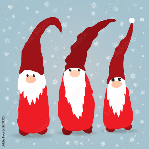 Scandinavian christmas gnomes in winter background photo
