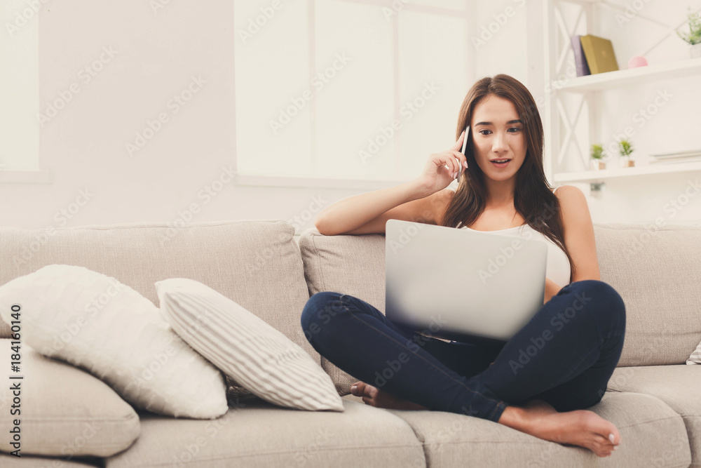 Freelancer working at home with laptop and mobile Freelancer working at home with laptop and mobile
