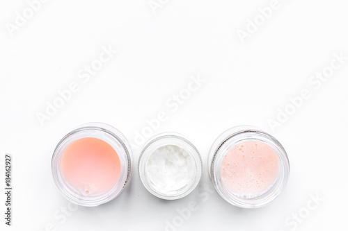 Professional cosmetics for cosmetologist on white background top view copyspace