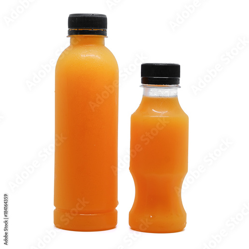 Bottles of fresh orange jui...