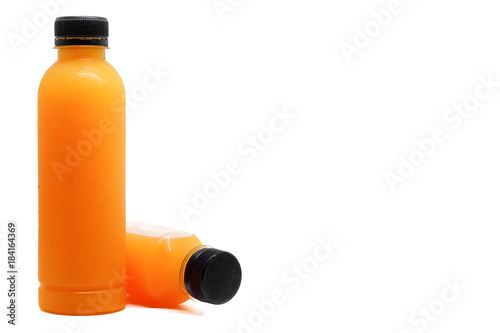 Bottles of fresh orange jui...