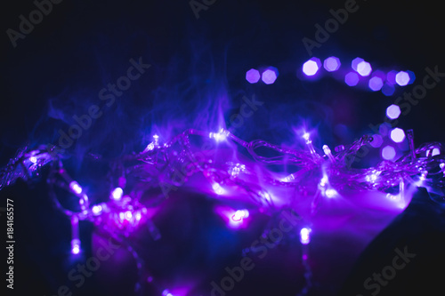 Purple garlands in the smoke