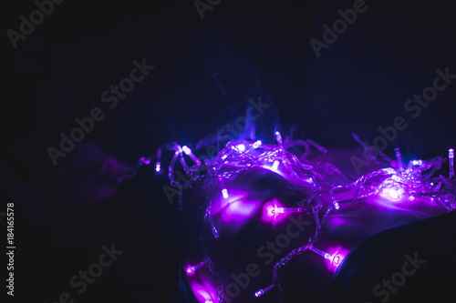 Purple garlands in the smoke