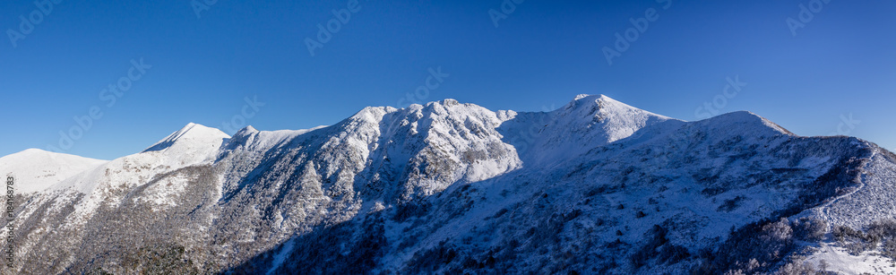 Panoramic view of snowy mountains in Galicia, Spain.