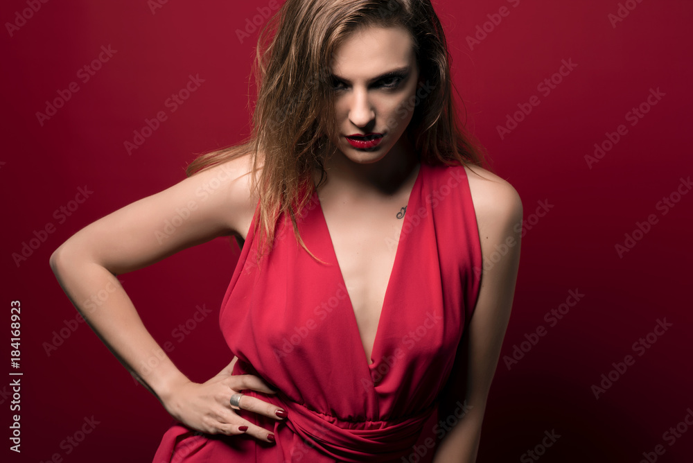 beauty girl with red dress in red background beauty girl with red dress in red background