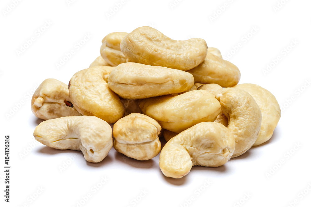 Roasted cashew nuts isolated on white background. Clipping path Roasted cashew nuts isolated on white background. Clipping path