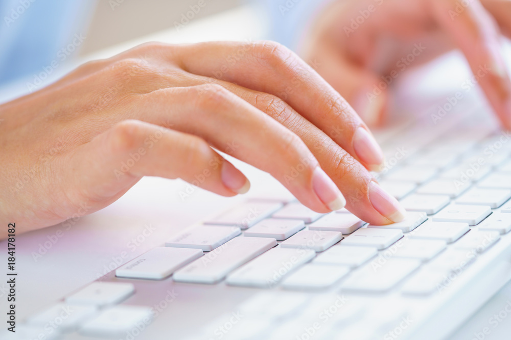 Female woman office worker typing on the keyboard Female woman office worker typing on the keyboard