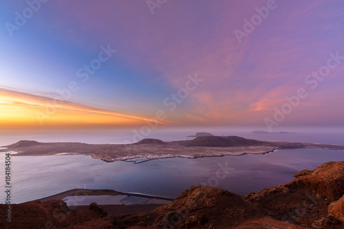 Sunset in La Graciosa. Canary islands. Beautiful wiew of the island with a color sky.