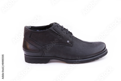 Black men's shoe.   A black leather men's shoe isolated on white background © bob_sato_1973