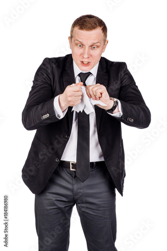 businessman tearing up a document, contract or agreement