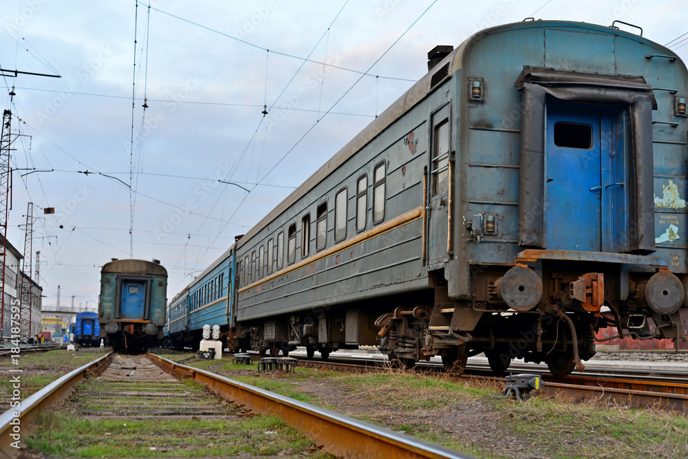 Passenger and freight train. Passenger diesel train traveling speed railway wagons journey light