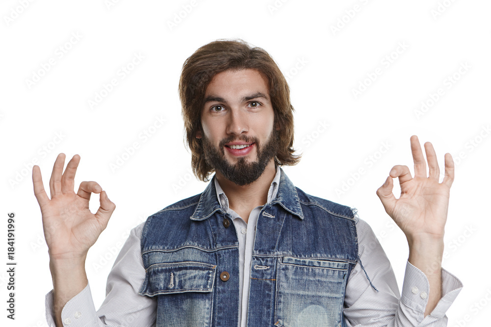 Φωτογραφία Picture of fashionable positive young European guy with fuzzy beard posing in st